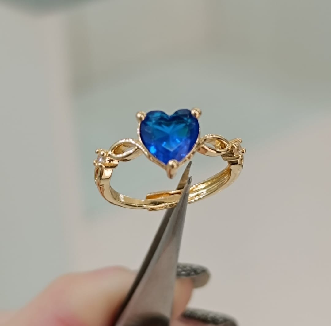 ANELLI IN ACCIAO CON CUORE E BRILLNTINI LATERALI