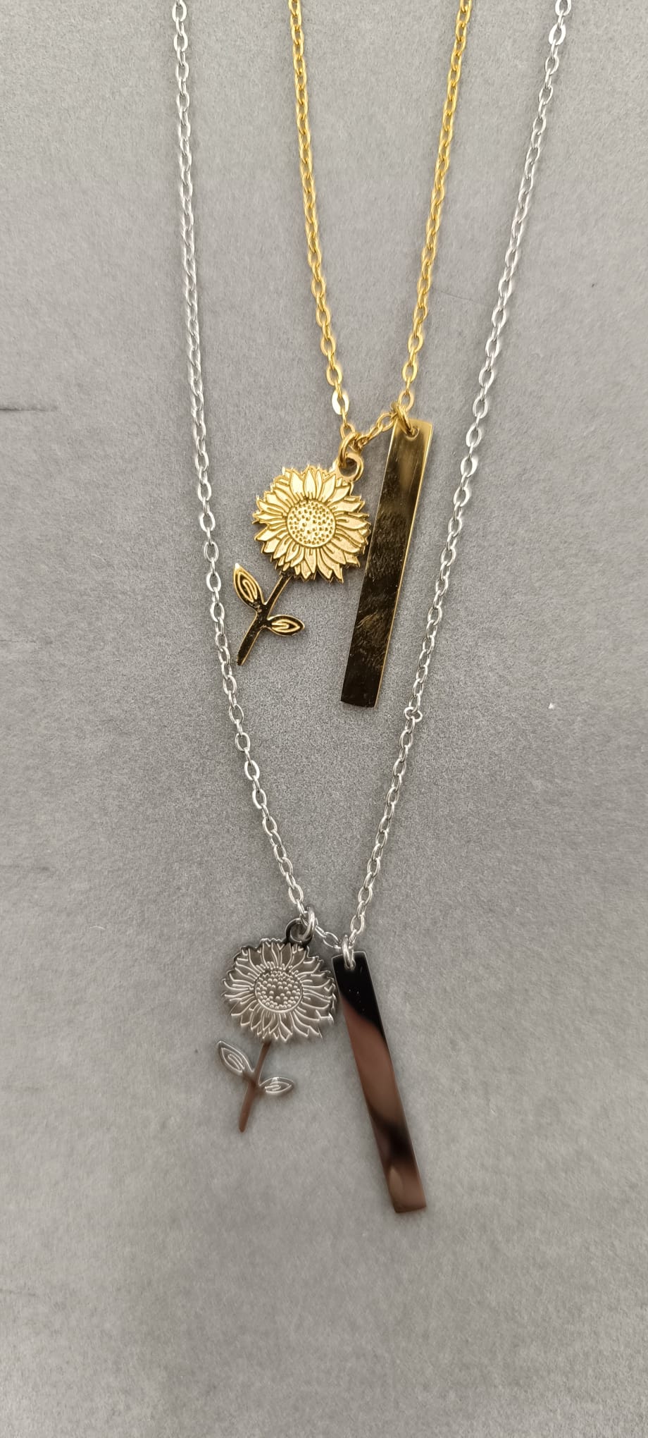 COLLANA CON GIRASOLE E PLACCHETTA IN ACCIAO