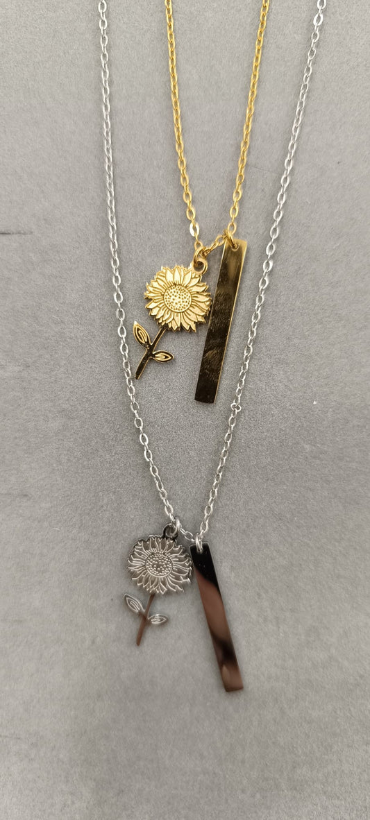 COLLANA CON GIRASOLE E PLACCHETTA IN ACCIAO