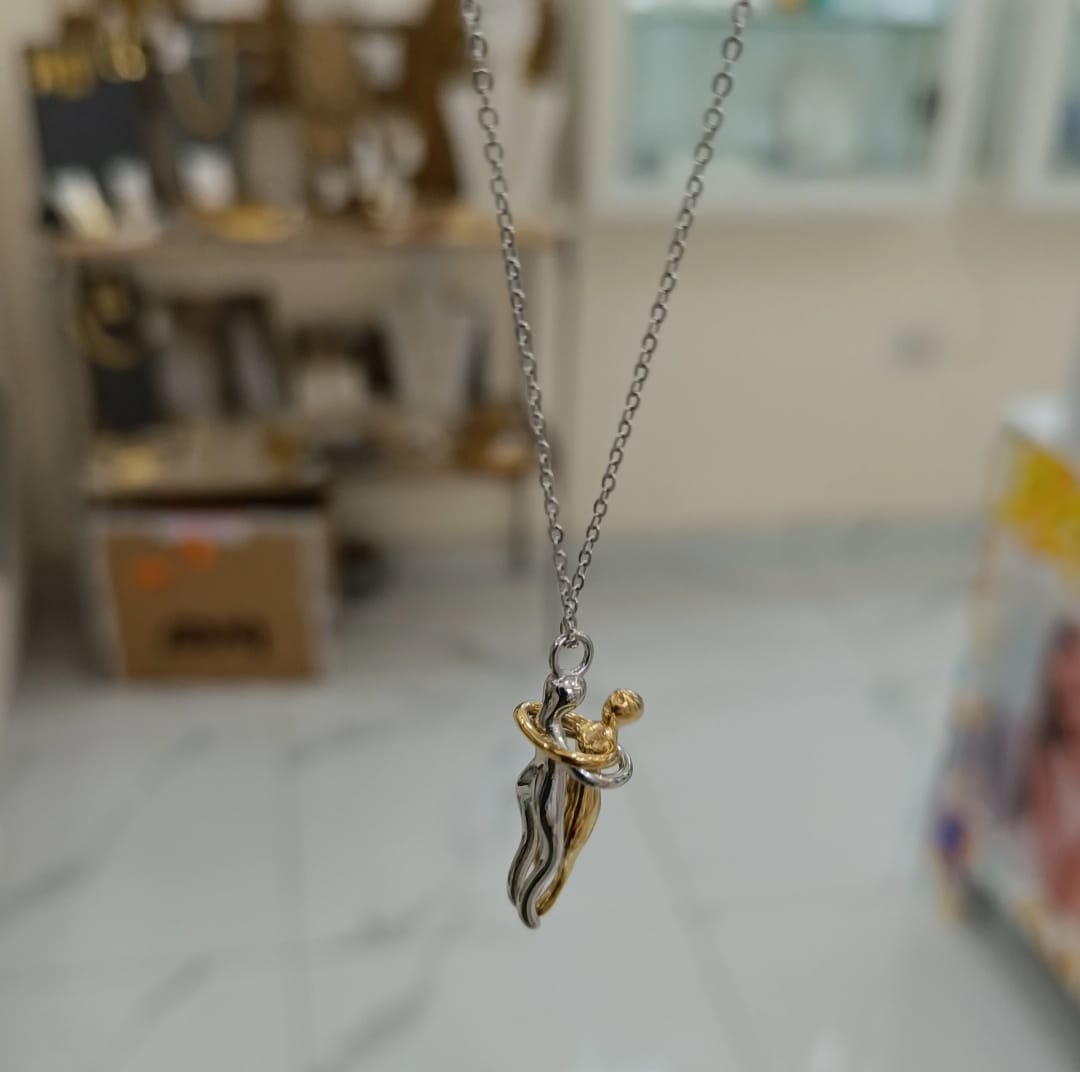 COLLANA ABBRACCIO LUI E LEI IN ACCIAIO